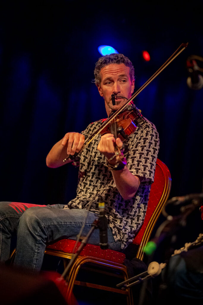 Andy Morrow on fiddle during a Trad concert in Dublin